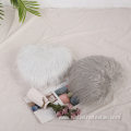 Plush silver silk heart-shaped pillow